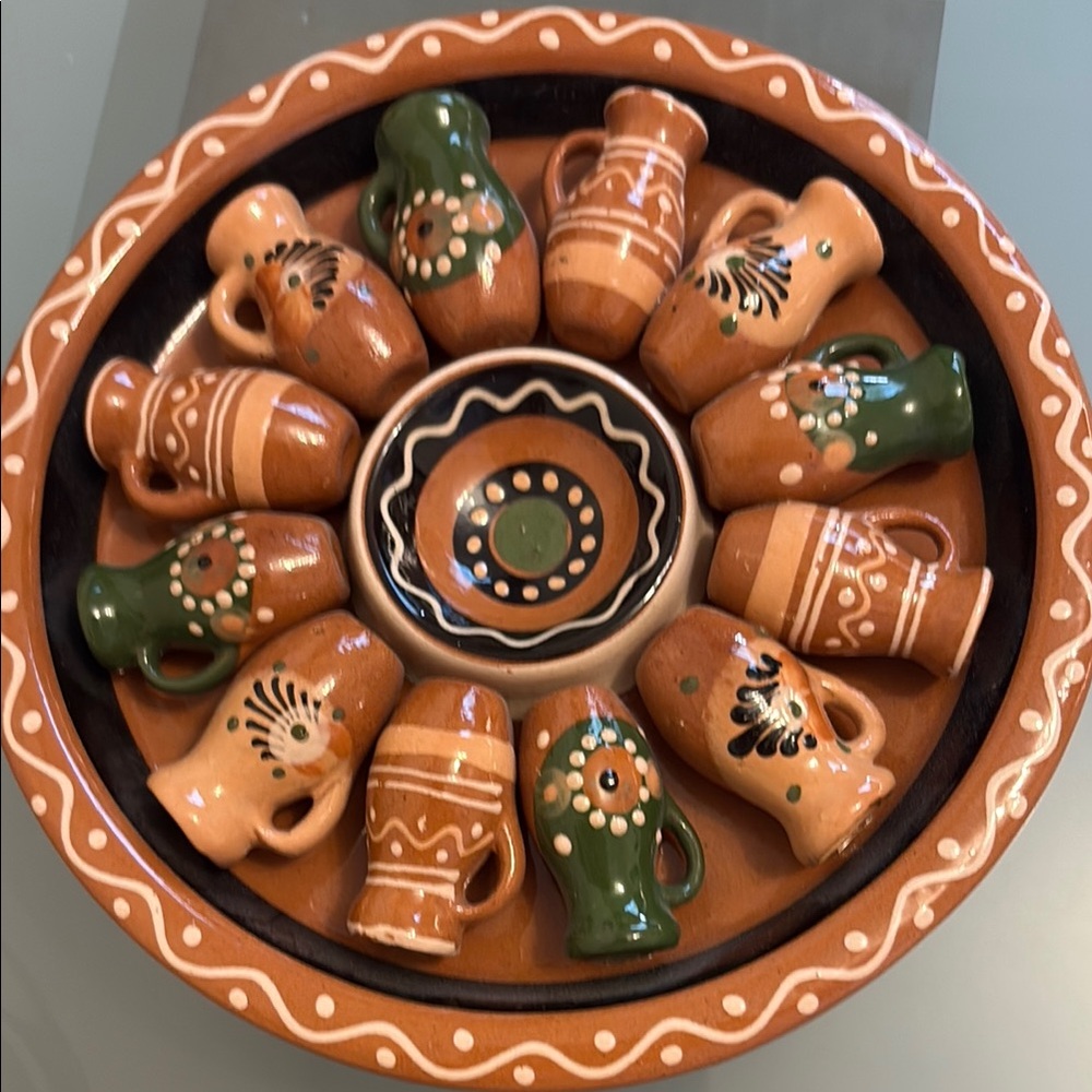 Brown and Green Ceramic Art Plate with Intricate Patterns